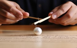 夹弹珠筷子技巧2025最新方法是什么？